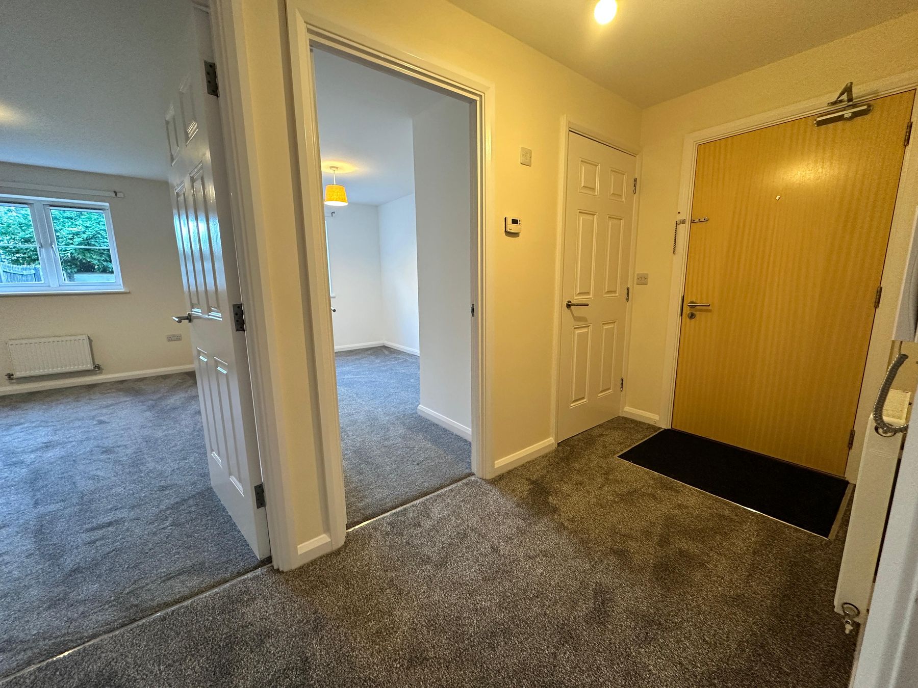 Entrance hall with storage cupboard