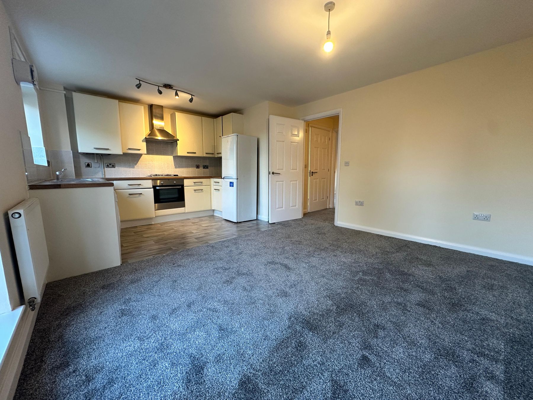 Living area opening onto the kitchen